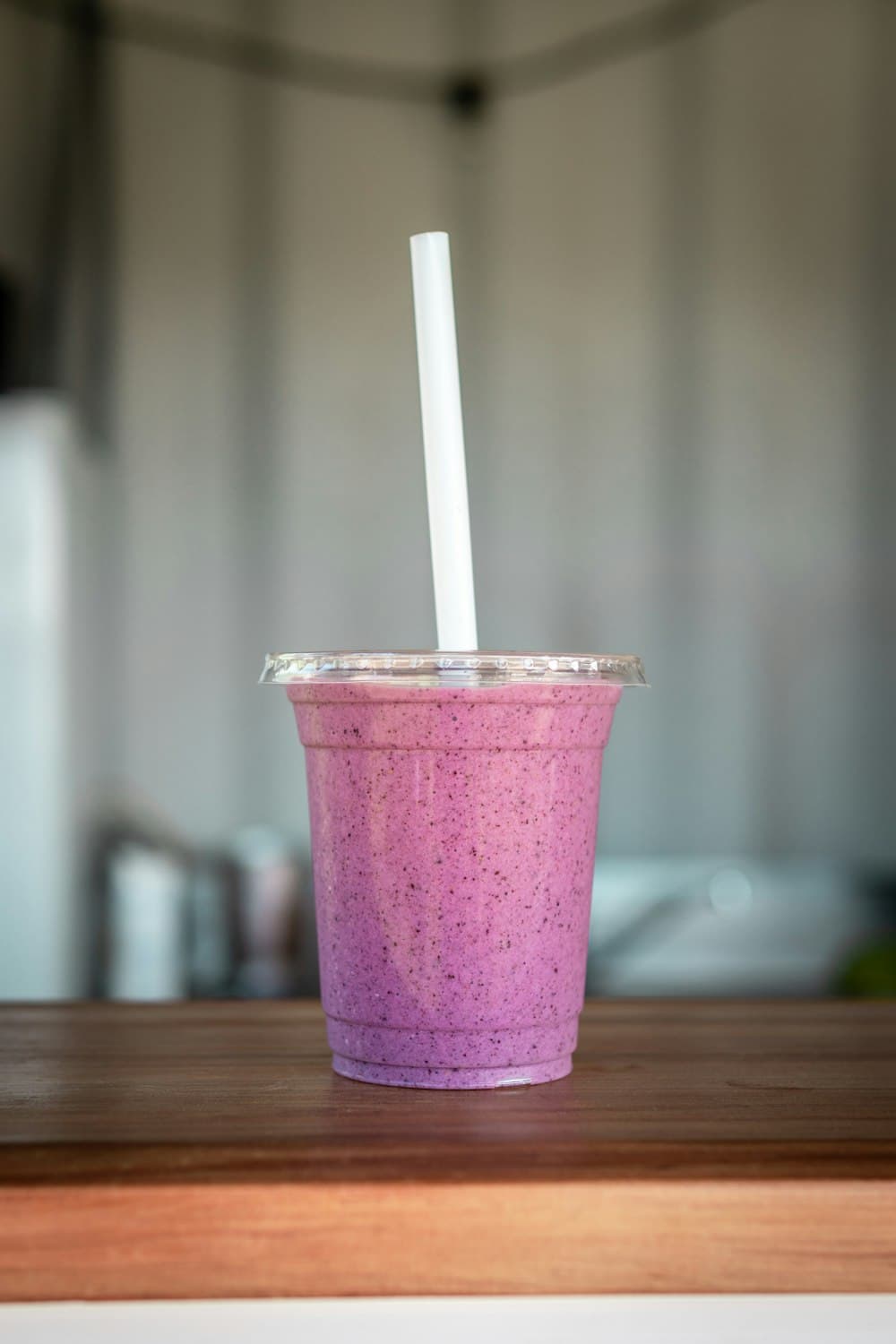 Vaso de batido de açaí para llevar